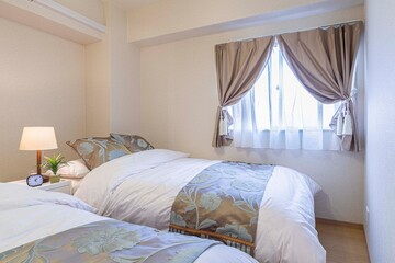 Single bed in modern small bedroom at apartment