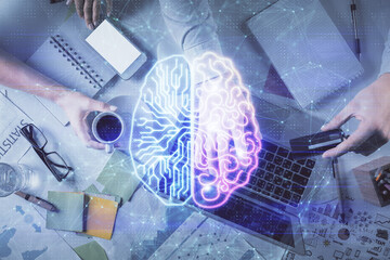 Double exposure of man and woman working together and human brain hologram drawing. Brainstorm concept. Computer background. Top View.