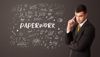 Businessman thinking with PAPERWORK inscription, business education concept