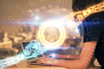 Double exposure of woman hands typing on computer and crypto market theme hologram drawing. Blockchain concept.