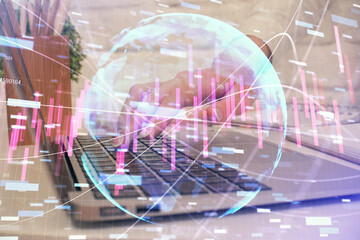 Multi exposure of woman hands typing on computer and forex chart hologram drawing. Stock market analysis concept.