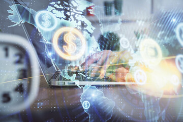 Double exposure of woman hands typing on computer and forex chart hologram drawing. Stock market...