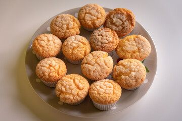 Home baked sugar coated muffins on a plate