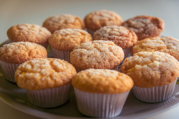 Home baked sugar coated muffins on a plate