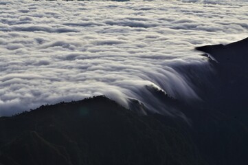A sea of clouds, layer of clouds viewed from the top of a mountain