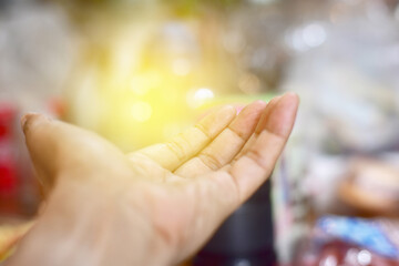 Close up of hands holding glowing social network connections, innovative technology in science and communication concept.  