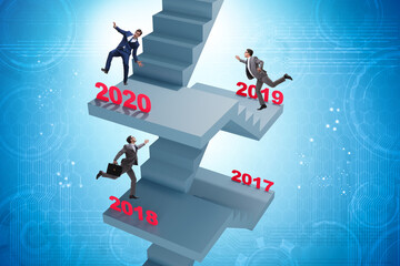 Businessman climbing stairs on yearly basis