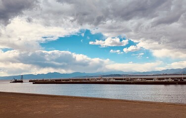 pier and clouds