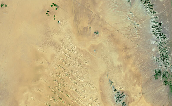 Satellite image of crops and mountains in the desert of Sonora Mexico. Generated from images of the satellite sentinel.