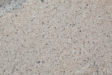 明るい灰色をした岩石の表面