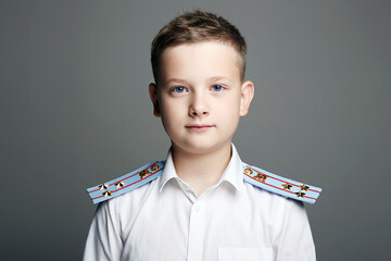 young officer. handsome boy weared in uniform. Police child
