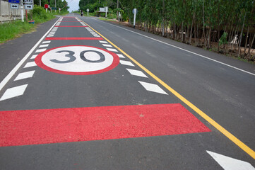 Speed limit sign on the road