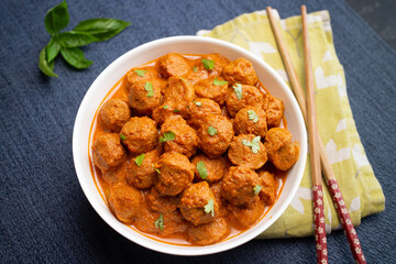 Vegan curry roast healthy soy meat, chunks, ball. Masala Soya Chunk Curry made using Soyabean nuggets and spices - protein rich food from India