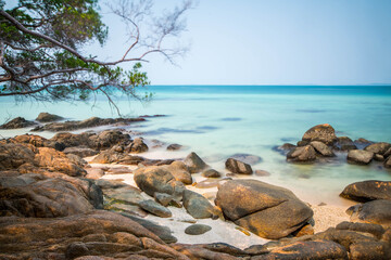 rock on the beach seascape long exposure