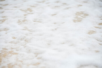 Sea wave bubble On the white sand beach