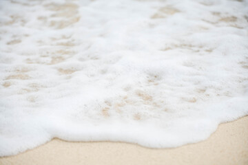 Sea wave bubble On the white sand beach