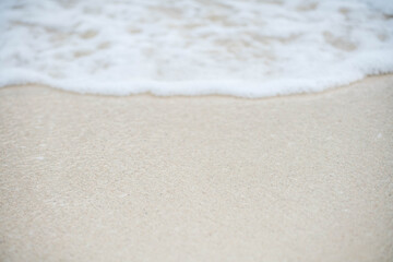 Sea wave bubble On the white sand beach