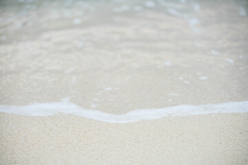Sea wave bubble On the white sand beach