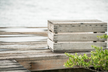 wooden chair on terrace on the beach