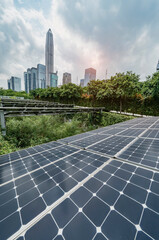 Ecological energy renewable solar panel plant with urban landscape landmarks