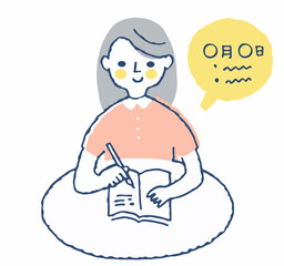 メモ帳に記入する女性