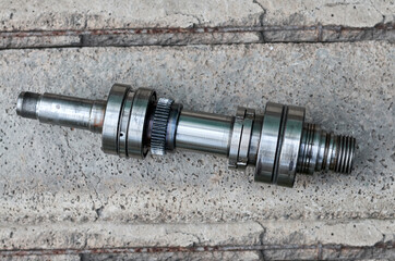 shaft gear bearing on concrete background