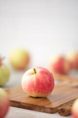 yellow red small apple with a handle