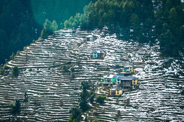 Colorful, vibrant ice patterns on farming fields in the  Himalayan mountains on Trek to Dalhousie,...