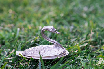  metal ornamental ducks on the grass
