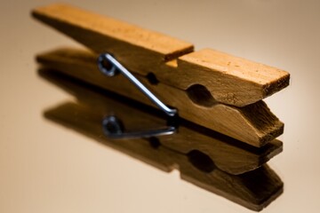 Cloth pin reflection depicts organize behavior reflects or inspires others. 