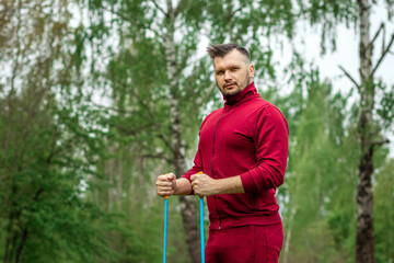 Nordic walking, sticks, hands close-up. The concept of a healthy lifestyle, cardio training. Copyspace.