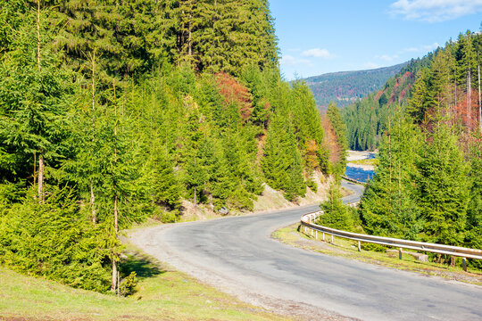 asphalt road through mountain valley. sunny weather, travel concept, beautiful nature scenery in autumn