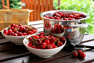 freshly picked cherries on the terrace table