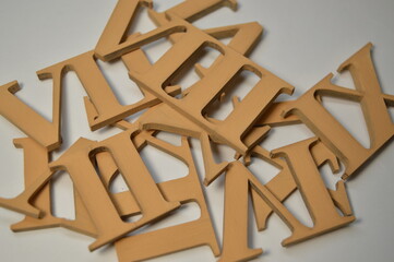 Wooden red roman numerals on a white background