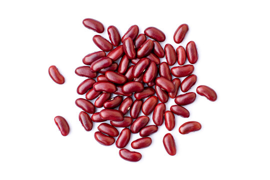 Closeup pile of red kidney beans isolated on white background. Top view. Flat lay.