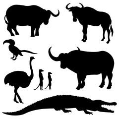 A set of silhouettes of African animals shrouds. Vector illustration on a black isolated background.
