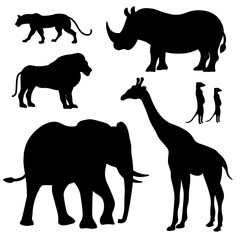 A set of silhouettes of African animals shrouds. Vector illustration on a black isolated background.