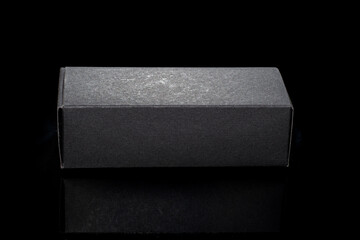 Small black box without inscriptions on a black background