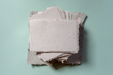 A stack of handmade paper. Waste paper recycling.