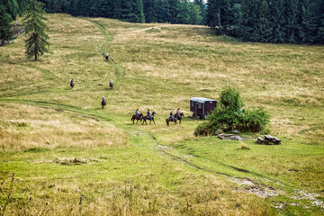 Men riding horses, Muran plain, Slovakia