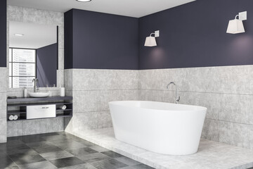 Fototapeta na wymiar White and blue bathroom corner, tub and sink