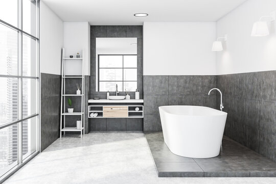 White and grey bathroom interior with shelves