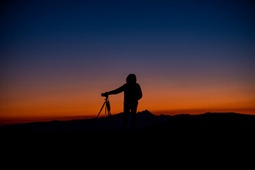 portrait of a photographer at the sunset