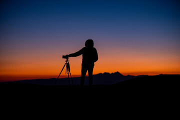 portrait of a photographer at the sunset