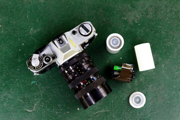 Old and vintage single lens reflex or SLR film camera at an outdoor park