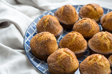 Delicious cupcakes on a blue plate