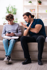 Father and son in exam preparation concept