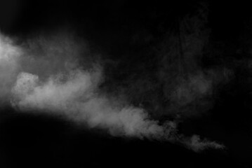 White smoke on a black background. The texture of scattered smoke. Blank for design. Layout for collages.