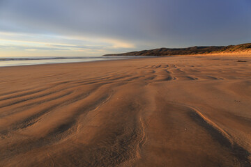 Fototapeta na wymiar Sand pattern at the Bakers Beach, Narawntapu National Park, Tasmania