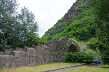 Fototapeta na wymiar Sanahin Bridge. It is build by AD 1195. a famous Historic site in Alaverdi, Lori, Armenia.